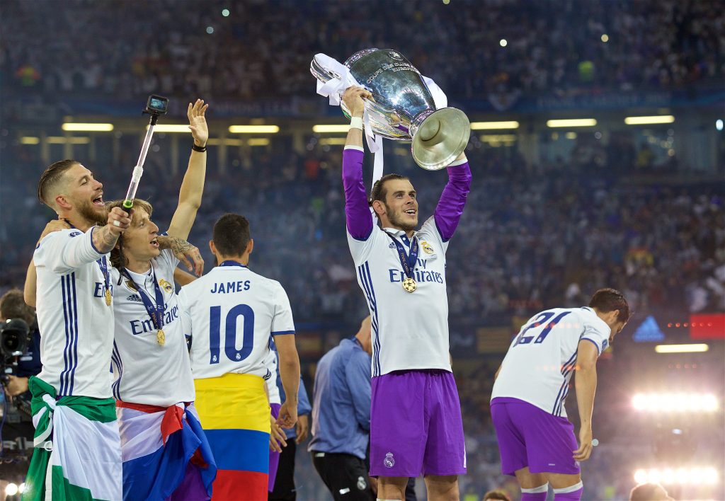 Saturday, June 3, 2017: Real Madrid's Gareth Bale lifts the European Cup trophy after the UEFA Champions League Final between Juventus FC and Real Madrid CF at the Stadium of Wales.